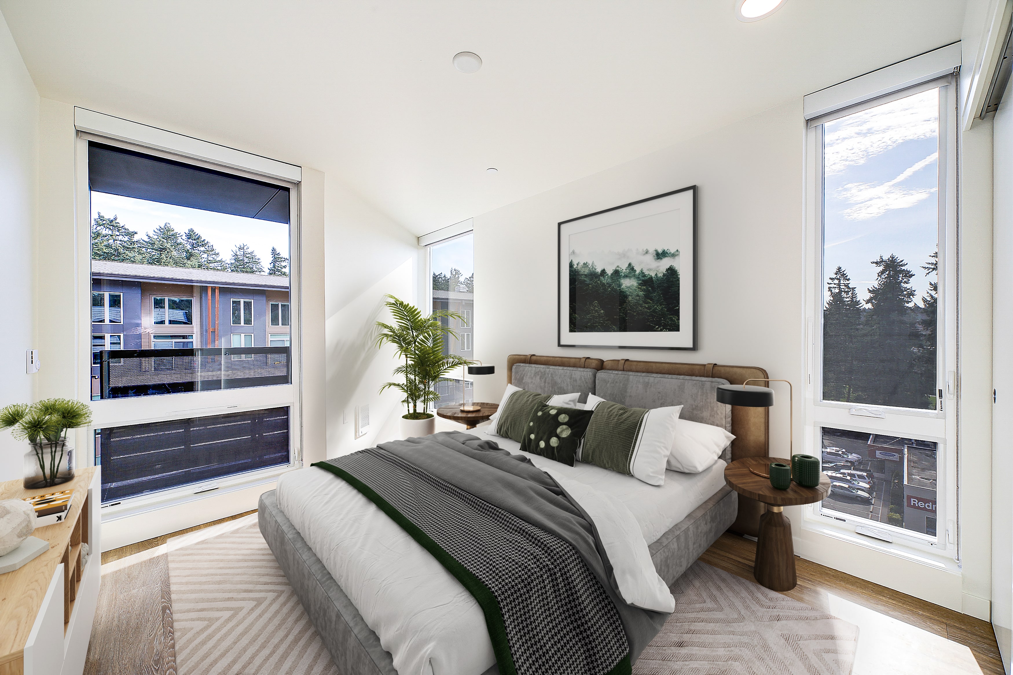 a bedroom with a bed and two large windows